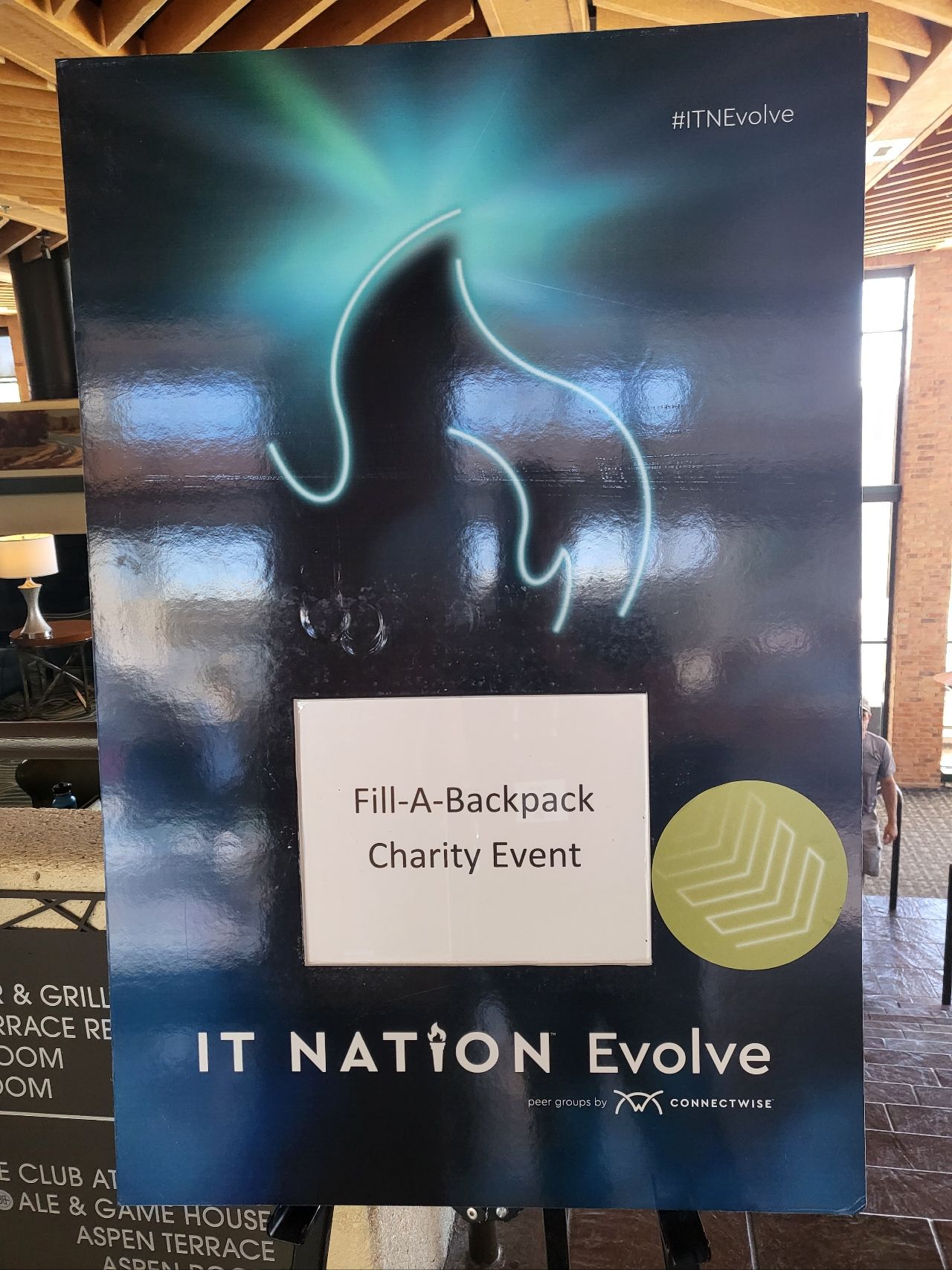 The Fill-A-Backpack charity event sign at IT Nation Evolve, 2022